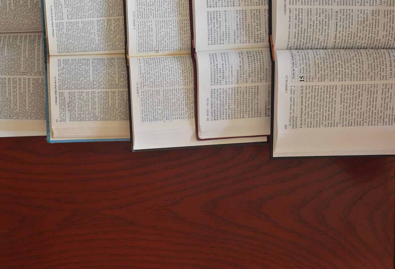 stack of open bibles
