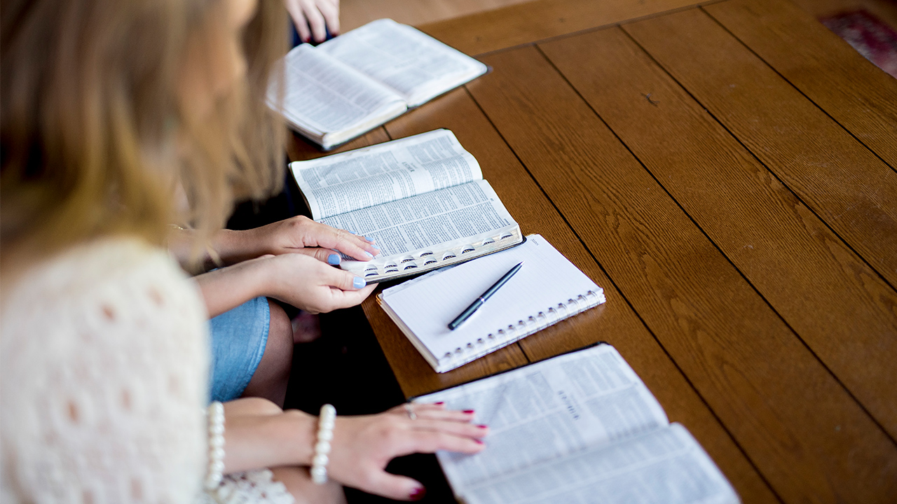 women studying the Bible together